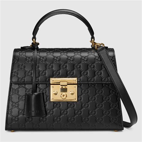 gucci padlock signature bag on a person|genuine Gucci padlock bag.